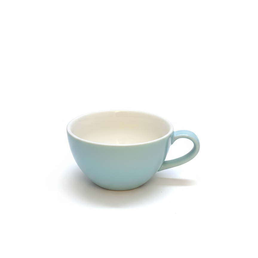 Light blue ceramic cup on a white background