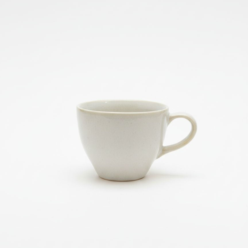 White ceramic mug on a white background